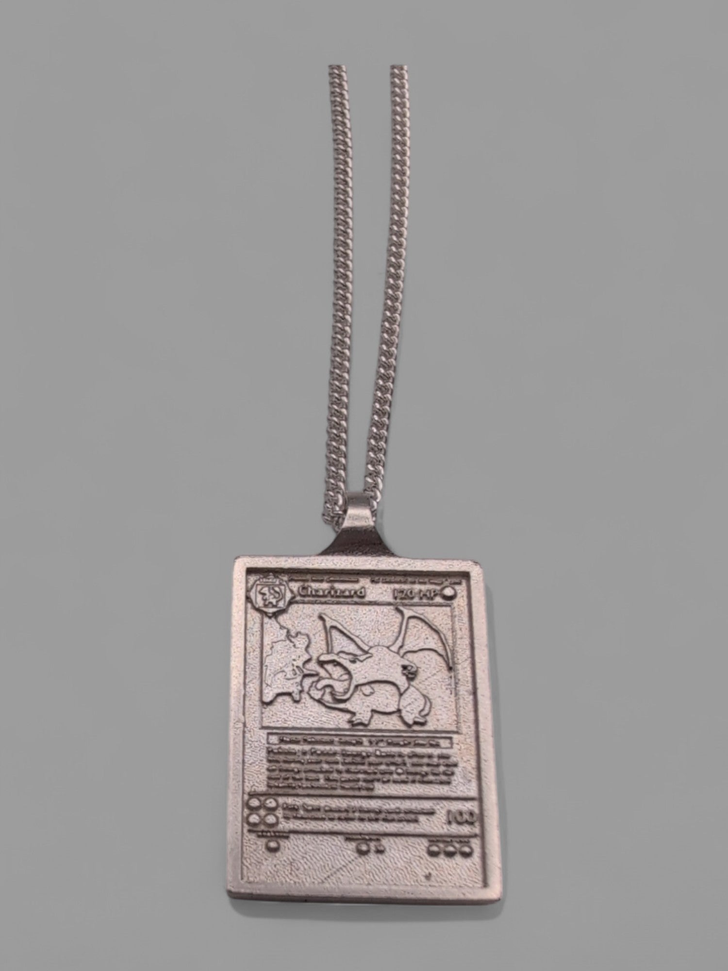 Sterling Silver Charizard Card Pendant | Rowan Silversmiths Rowan SilverSmiths Sterling Silver Charizard Card Pendant | Rowan Silversmiths Rowan SilverSmiths