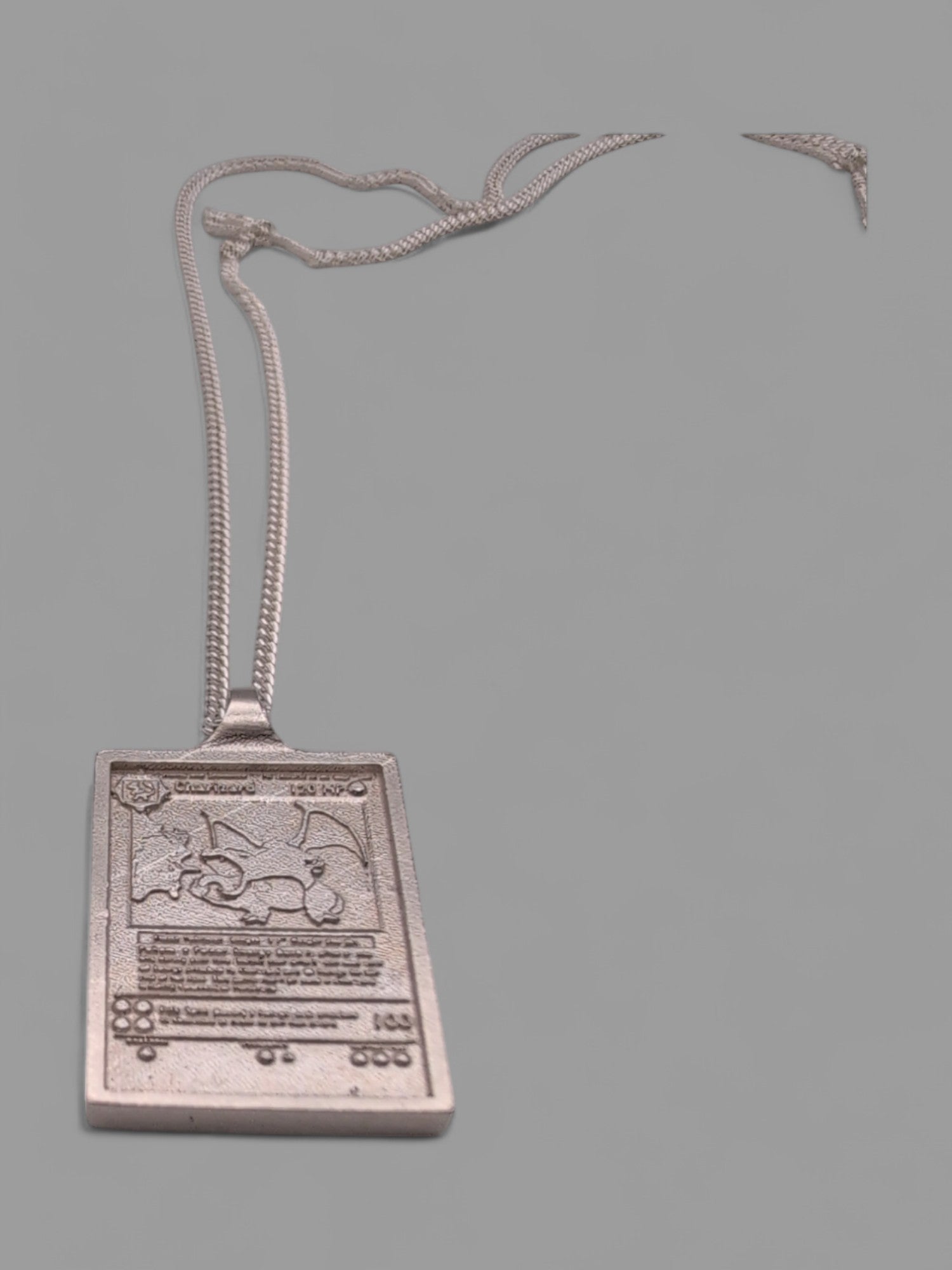 Sterling Silver Charizard Card Pendant | Rowan Silversmiths Rowan SilverSmiths Sterling Silver Charizard Card Pendant | Rowan Silversmiths Rowan SilverSmiths